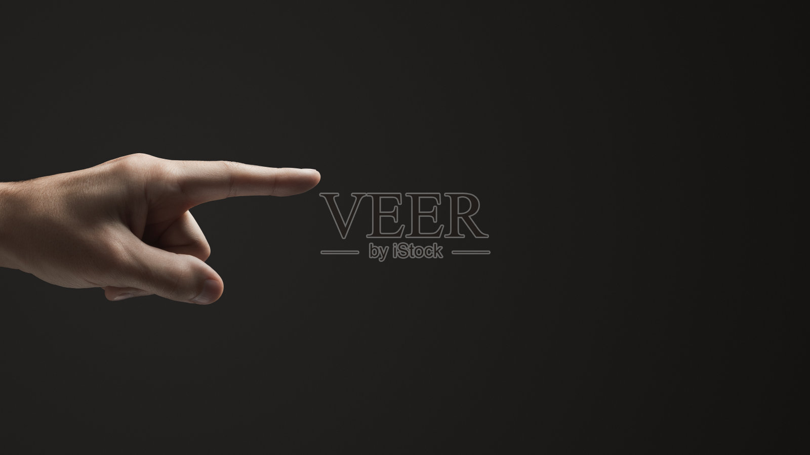 手形指针。黑暗的背景。副本的空间。照片摄影图片