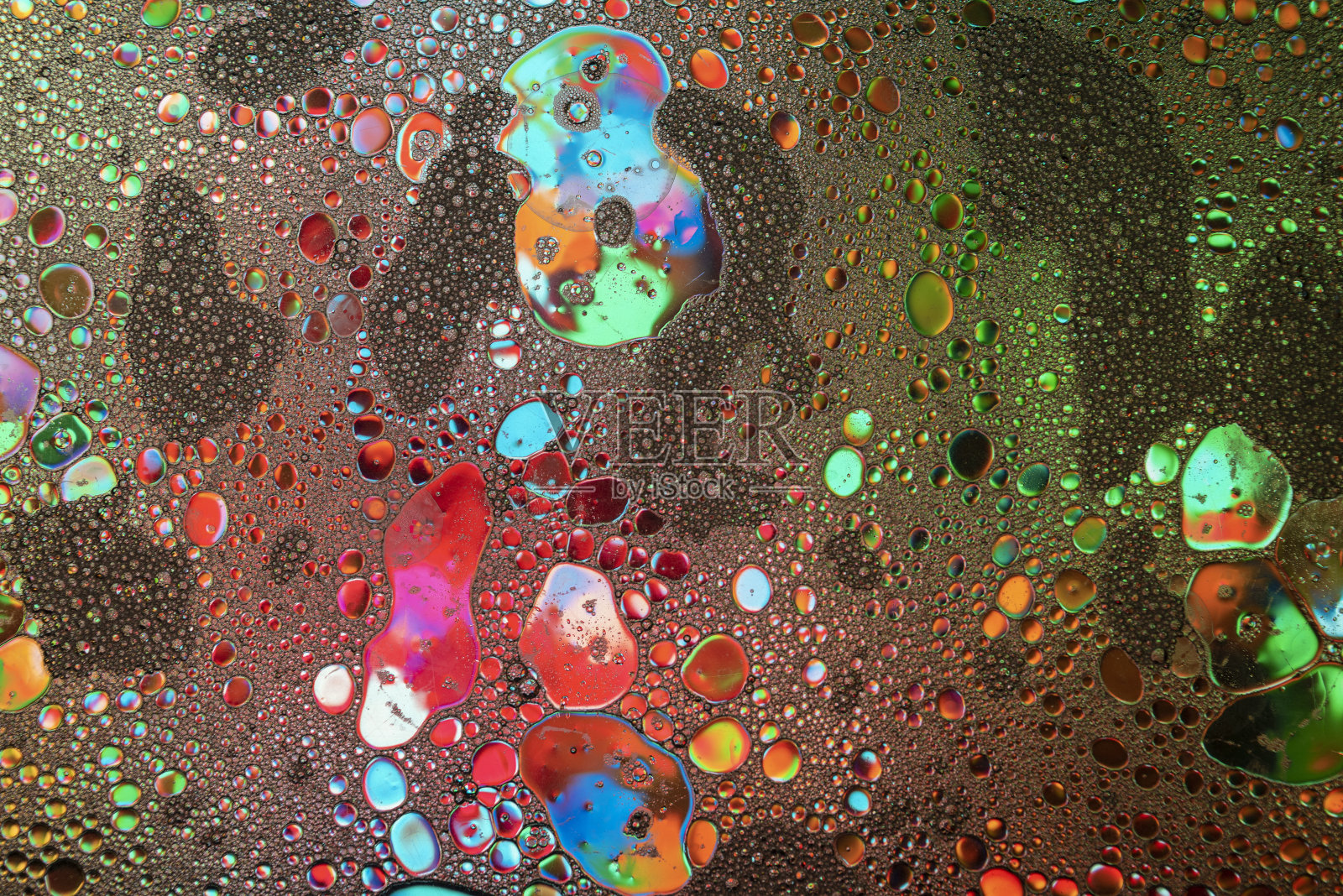 油在水里。多色抽象背景。照片摄影图片