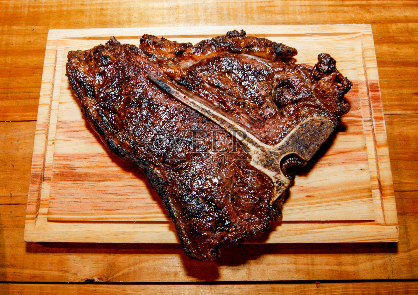 烤牛骨肉照片摄影图片