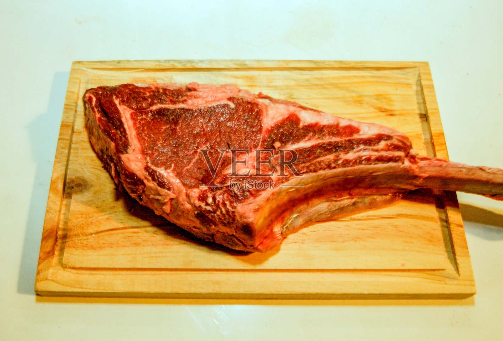 切尔顿干酪，生肉排照片摄影图片