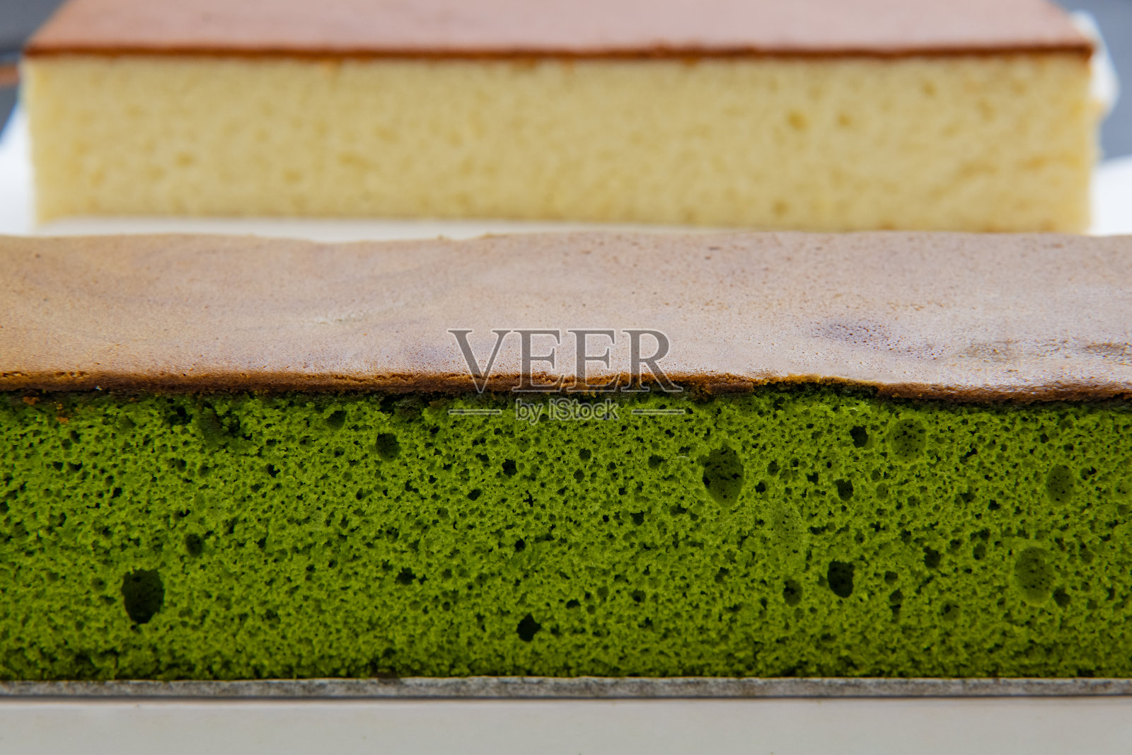 抹茶蜂蜜海绵蛋糕，castella蛋糕(日本海绵蛋糕)照片摄影图片