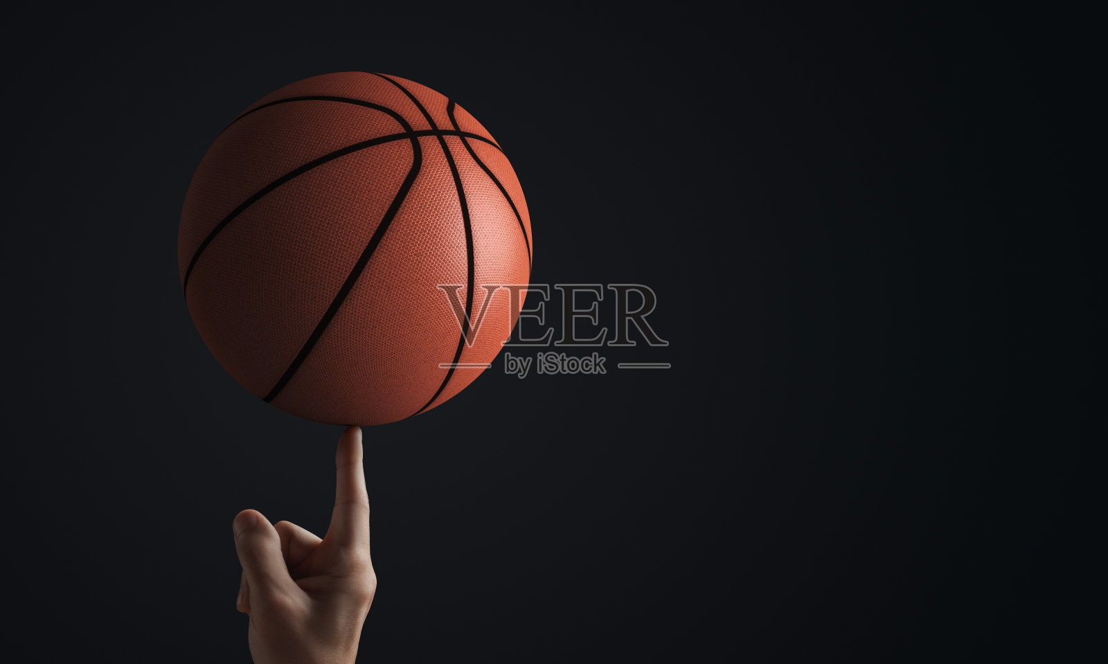 篮球旗帜。篮球球食指。照片摄影图片