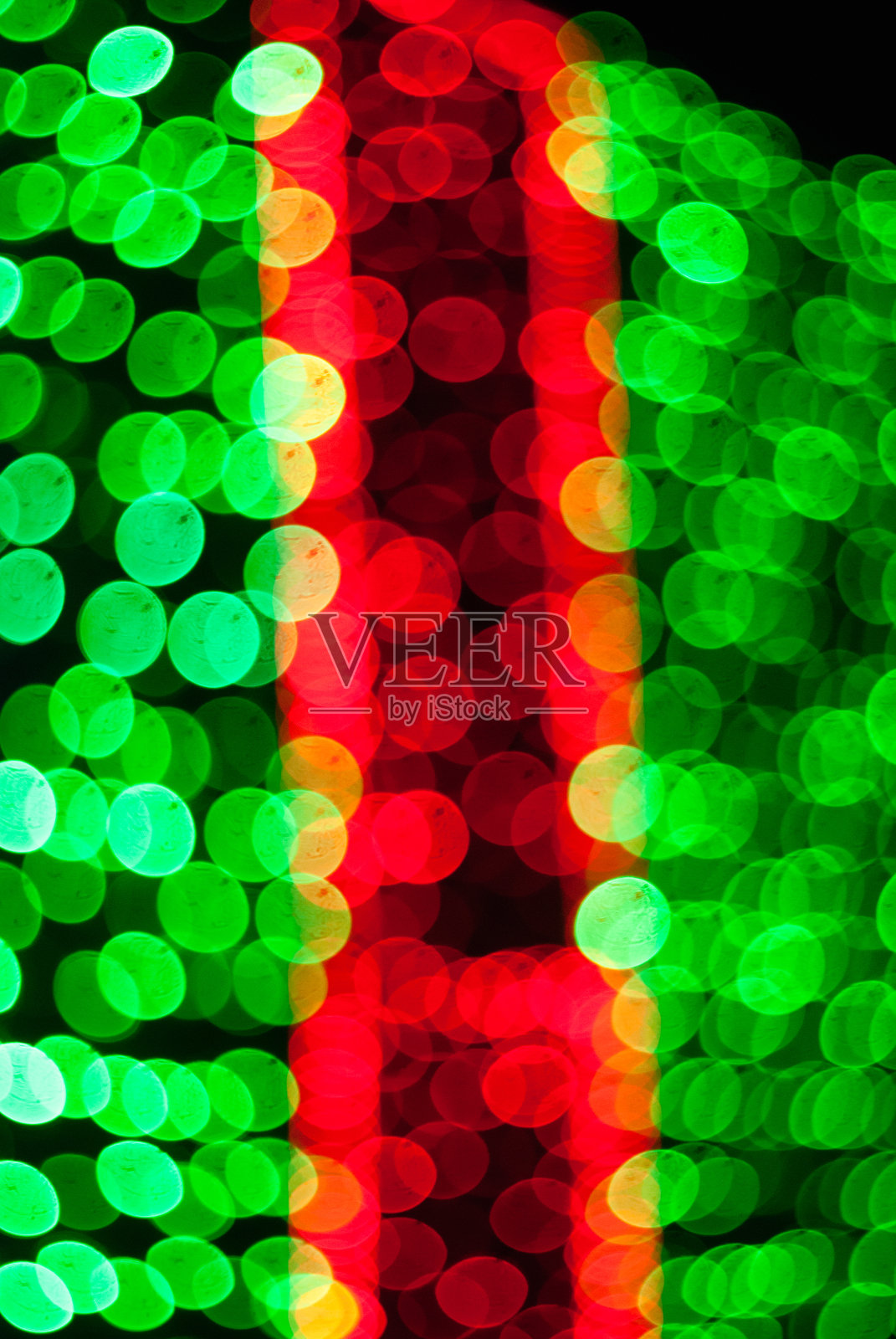 抽象模糊的圣诞灯光照片。圣诞节boken背景。照片摄影图片