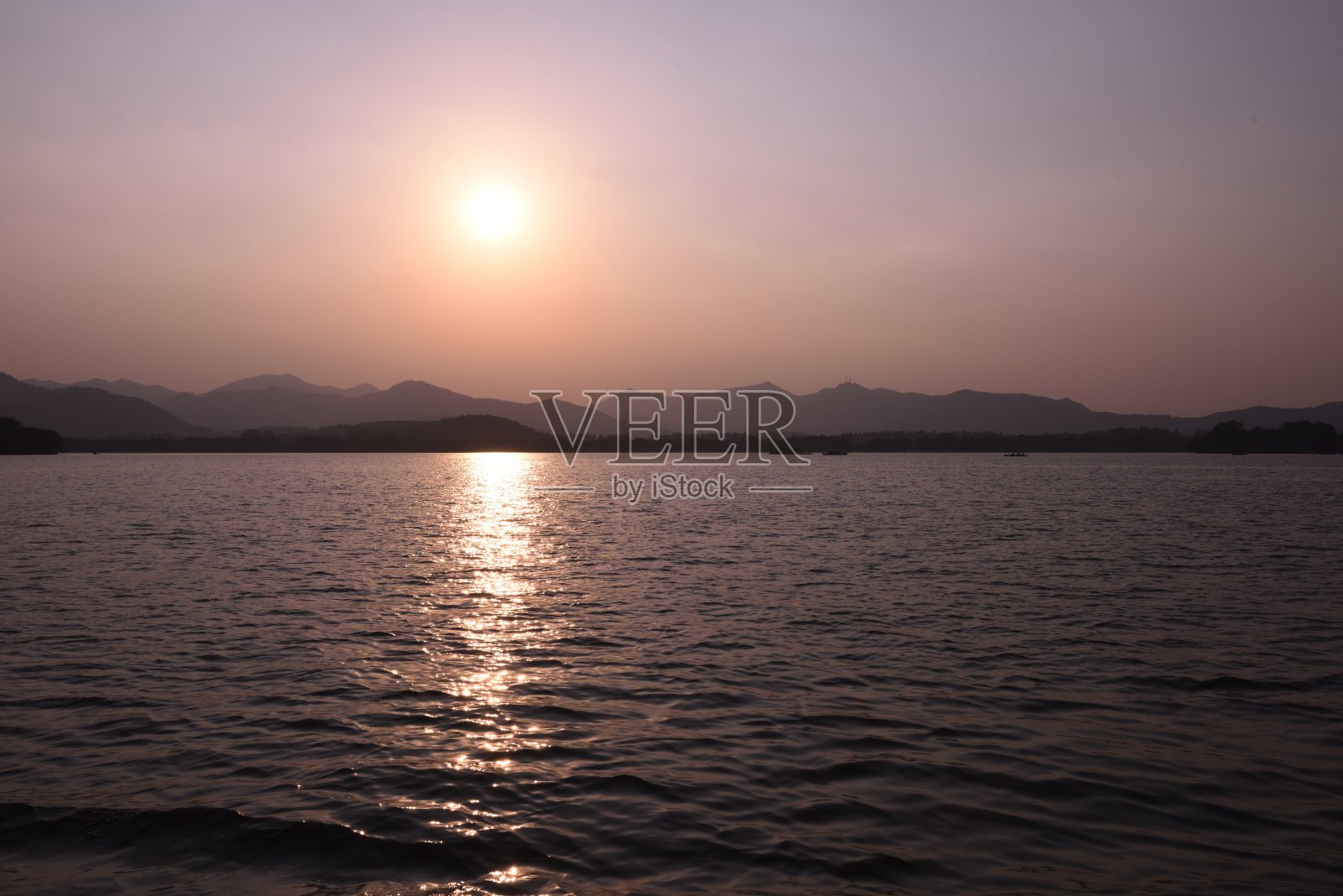 杭州西湖的日落照片摄影图片