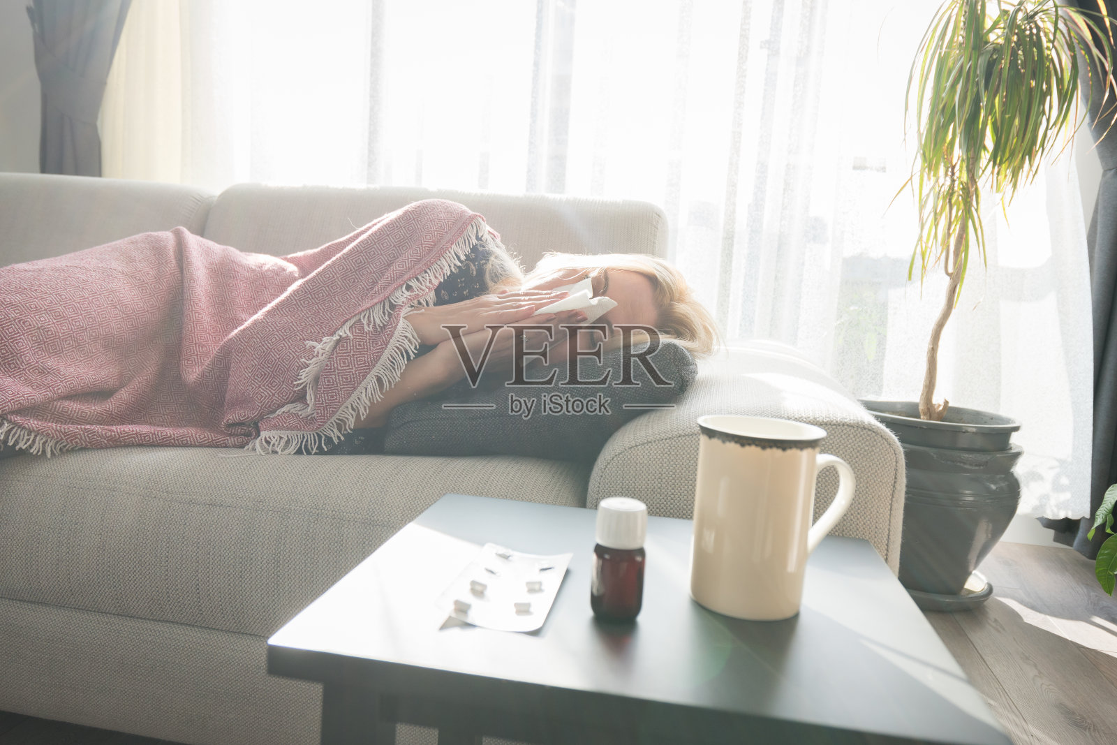 我真应该得流感的。照片摄影图片