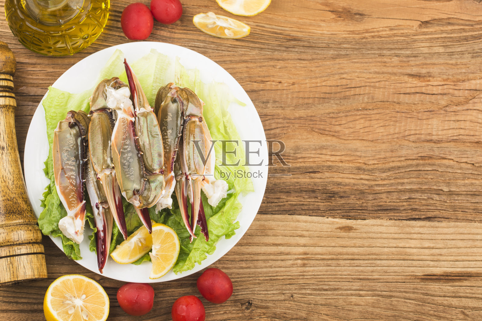 一盘新鲜的蟹爪照片摄影图片