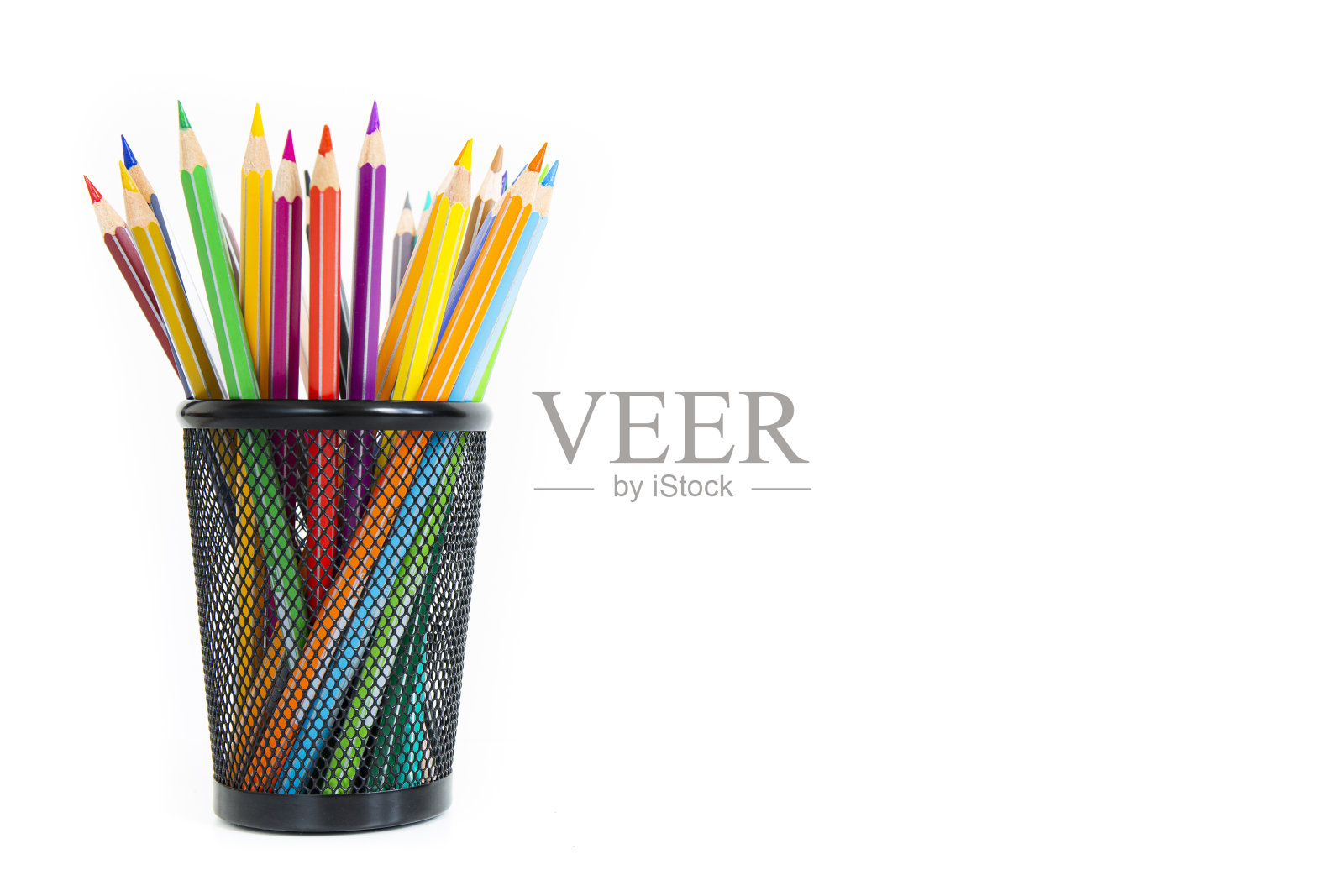 一束装在铅笔盒里的彩色铅笔照片摄影图片