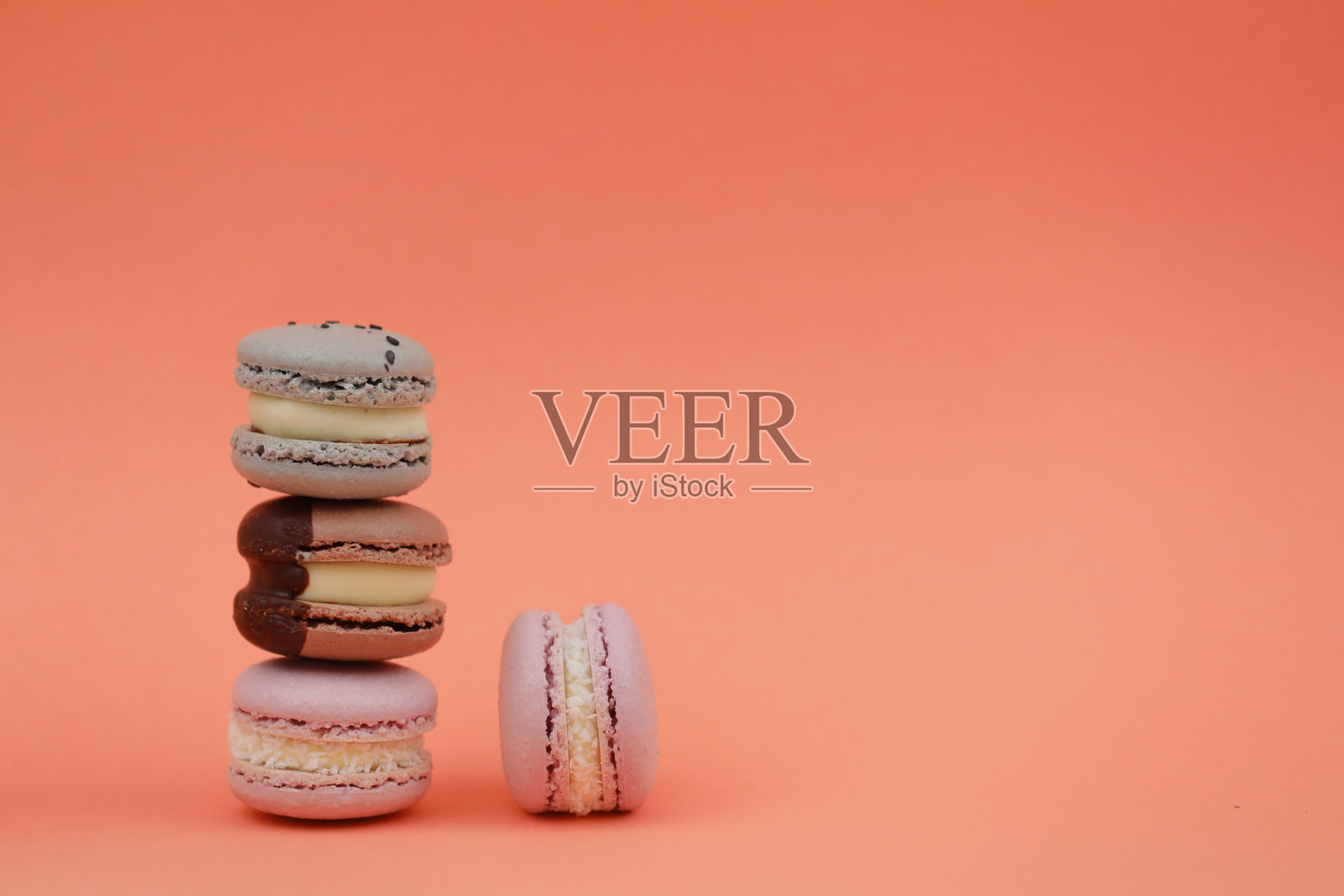 甜美多彩的法式马卡龙或粉红背景的马卡龙照片摄影图片