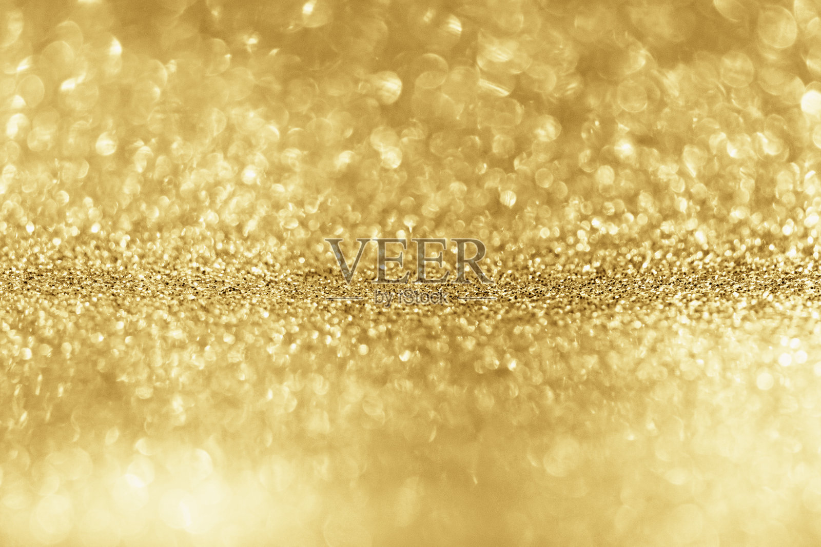 抽象的黄金闪闪发光与散景背景照片摄影图片