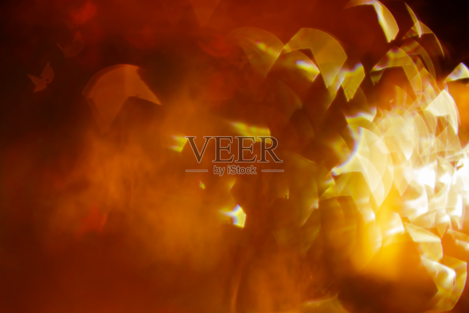 散焦背景的明亮灯光在小星星的形状照片摄影图片