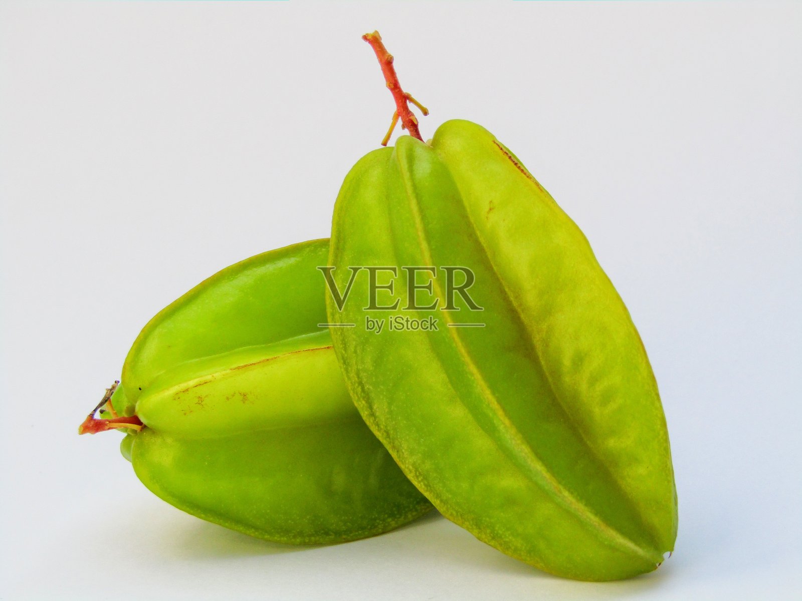 鲜杨桃又称杨桃，分离于白色背景上。杨桃库存图片照片摄影图片