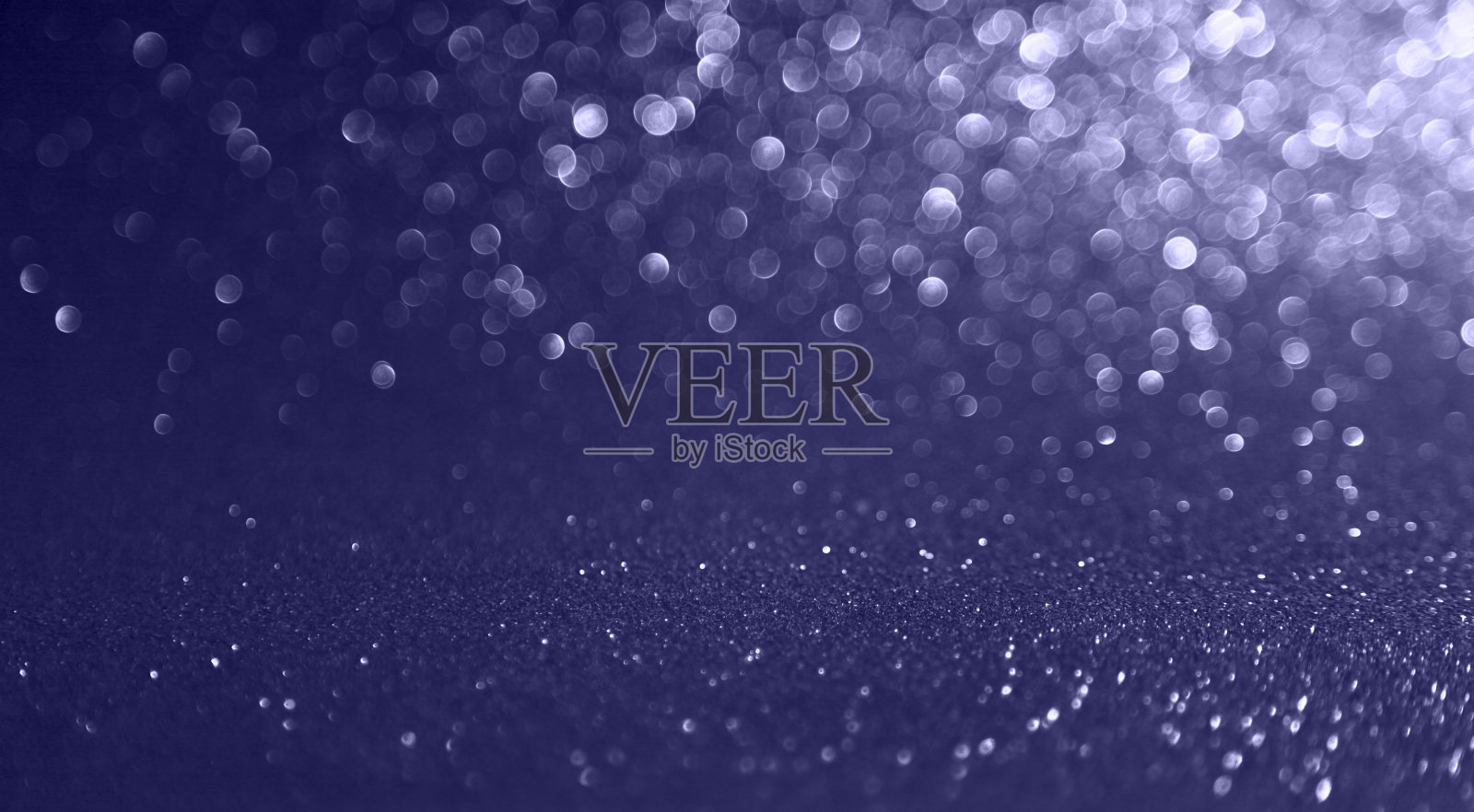 闪烁的灯光，散景的节日背景与纹理。照片摄影图片