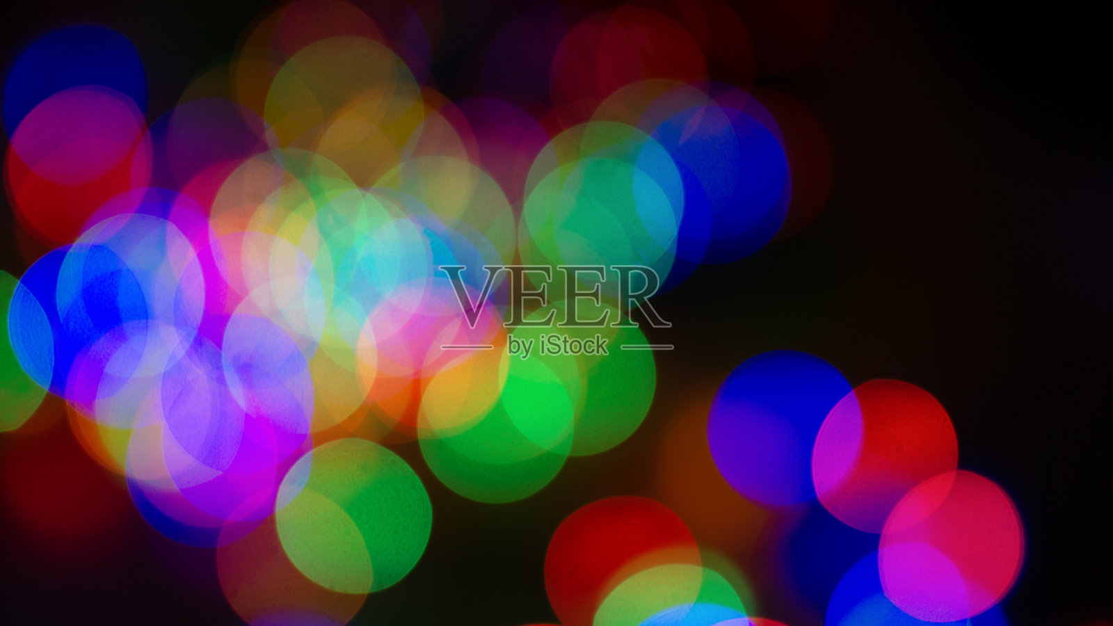 散焦多色圣诞模糊灯光夜晚抽象的散焦背景照片摄影图片