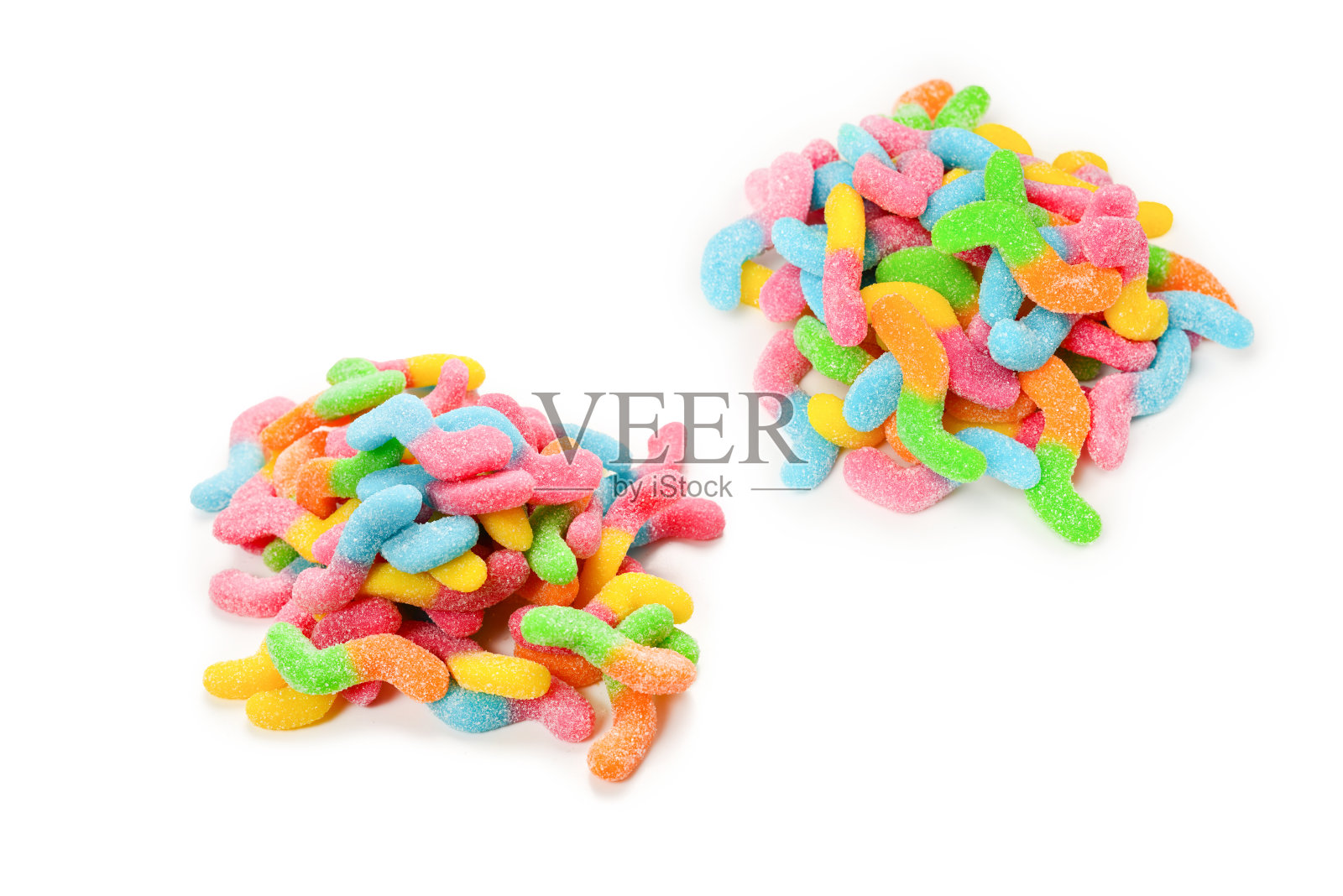 多汁的彩色果冻糖孤立在白色。粘性糖果。蛇。照片摄影图片