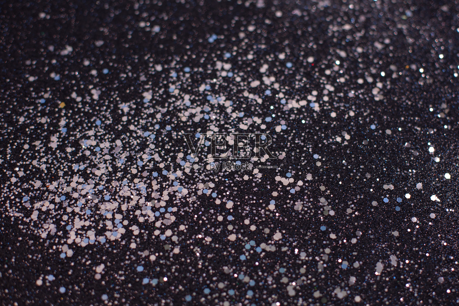 银色亮片闪闪发光。设计背景照片摄影图片