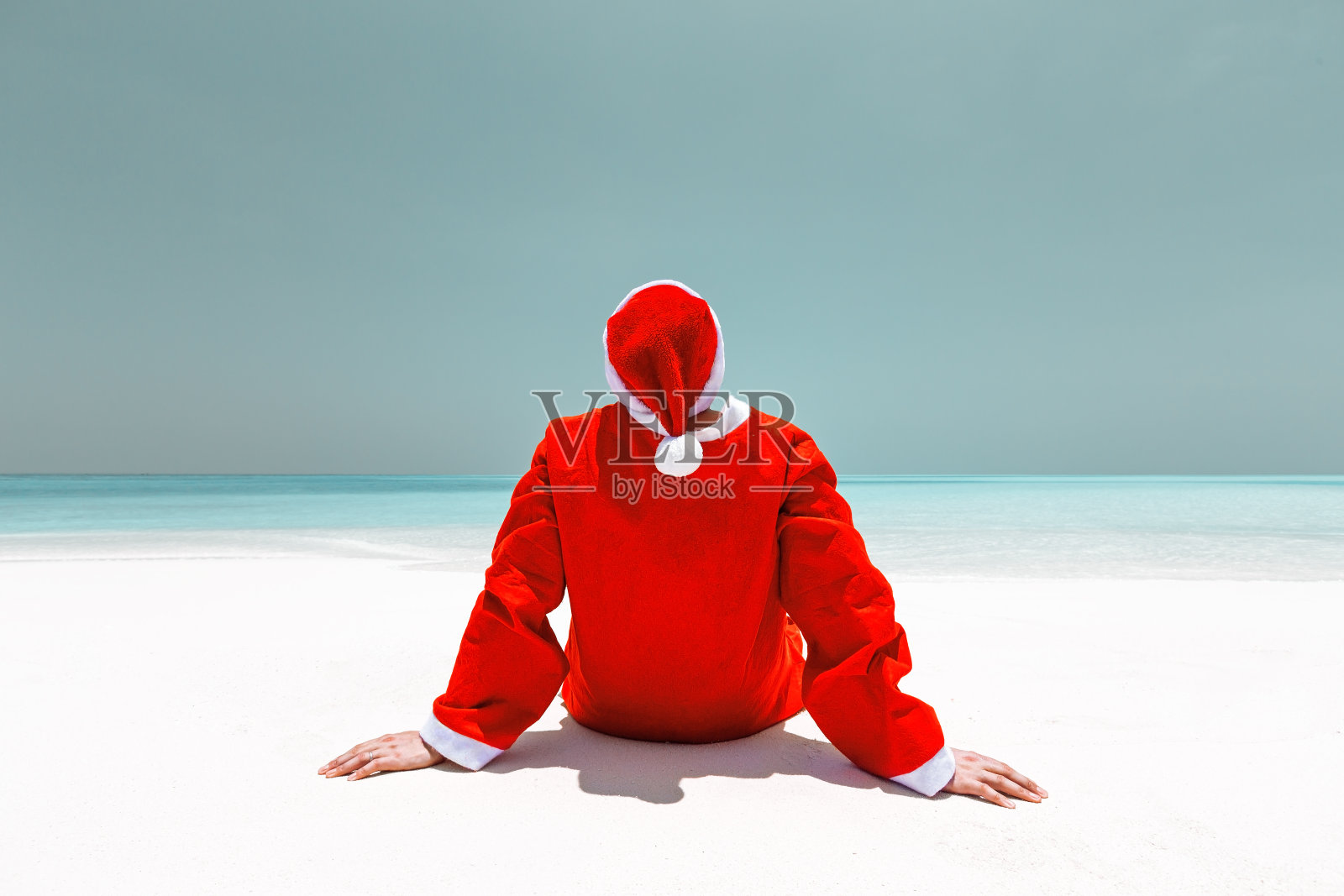 圣诞老人庆祝圣诞海滩照片摄影图片