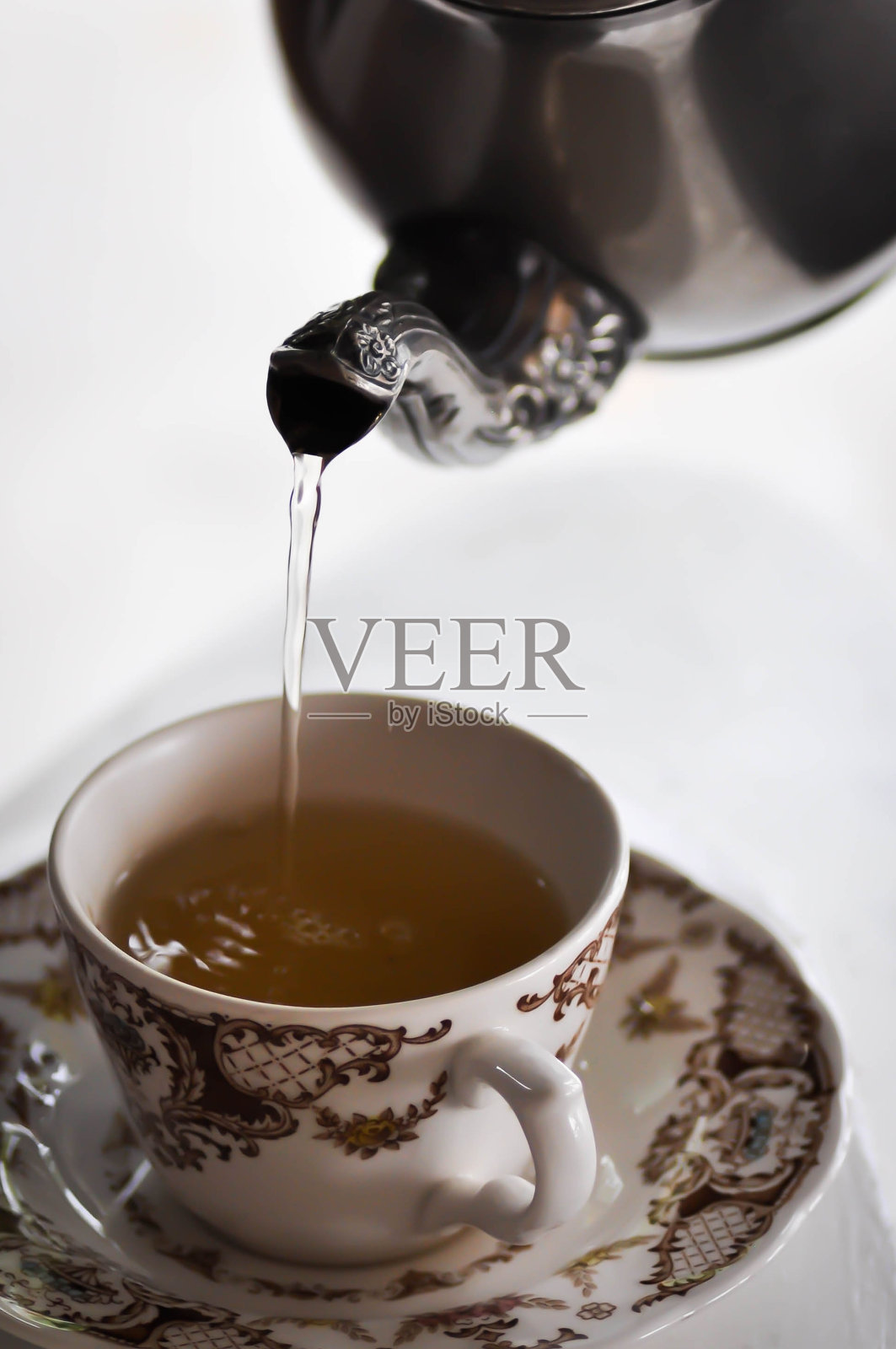 茶或者一杯茶加一个水壶照片摄影图片