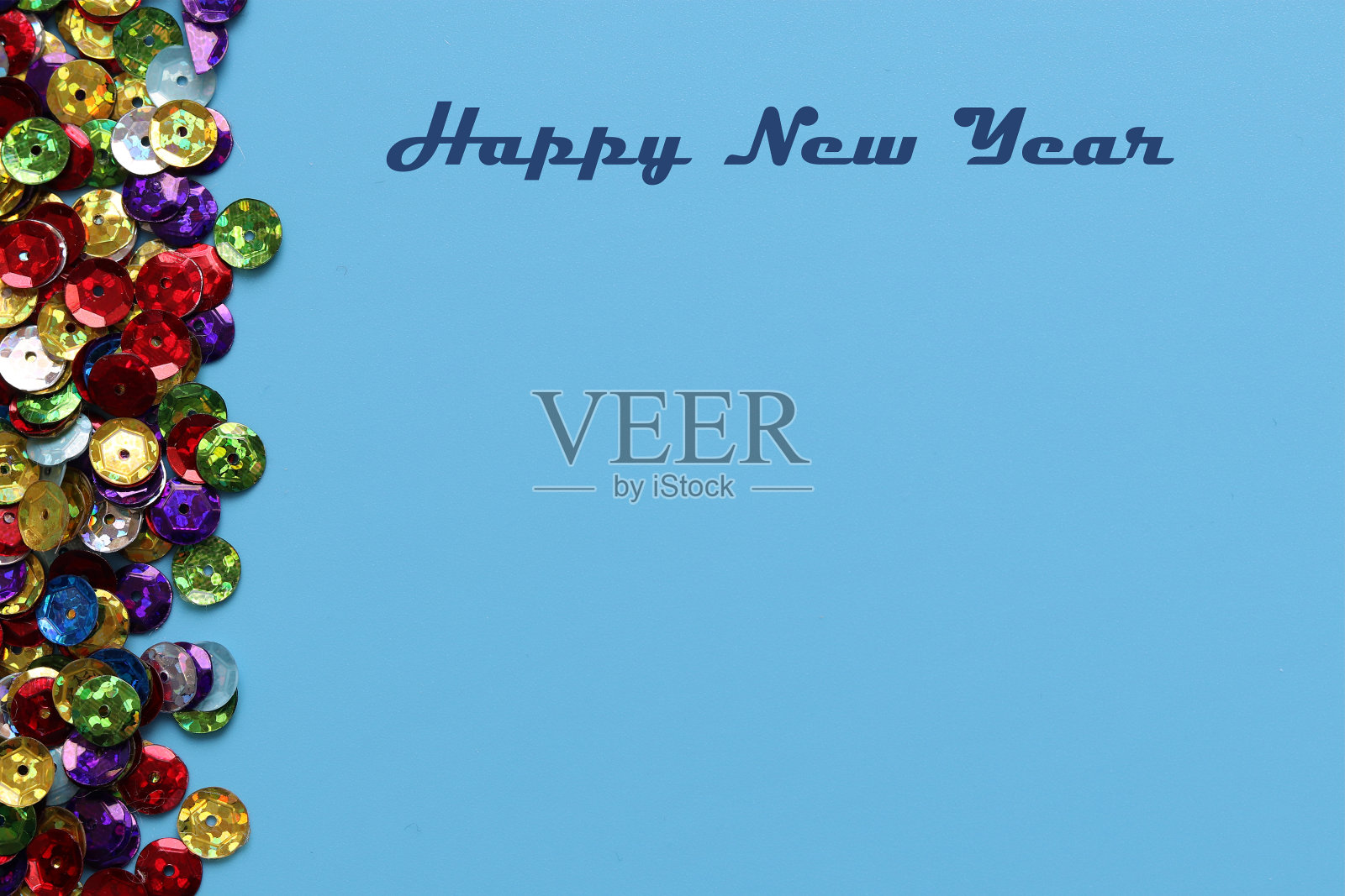 圣诞蓝色背景与火花和碑文新年快乐照片摄影图片