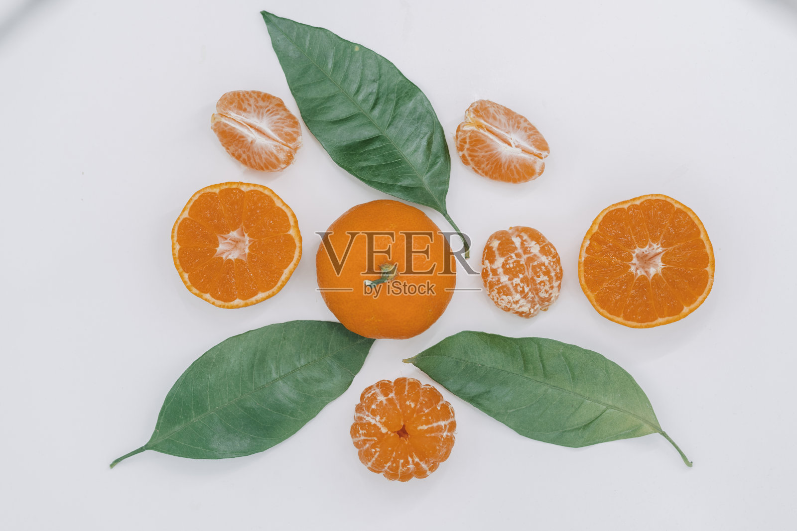 孤立在白色背景上的桔子或柑橘。前视图。平躺照片摄影图片