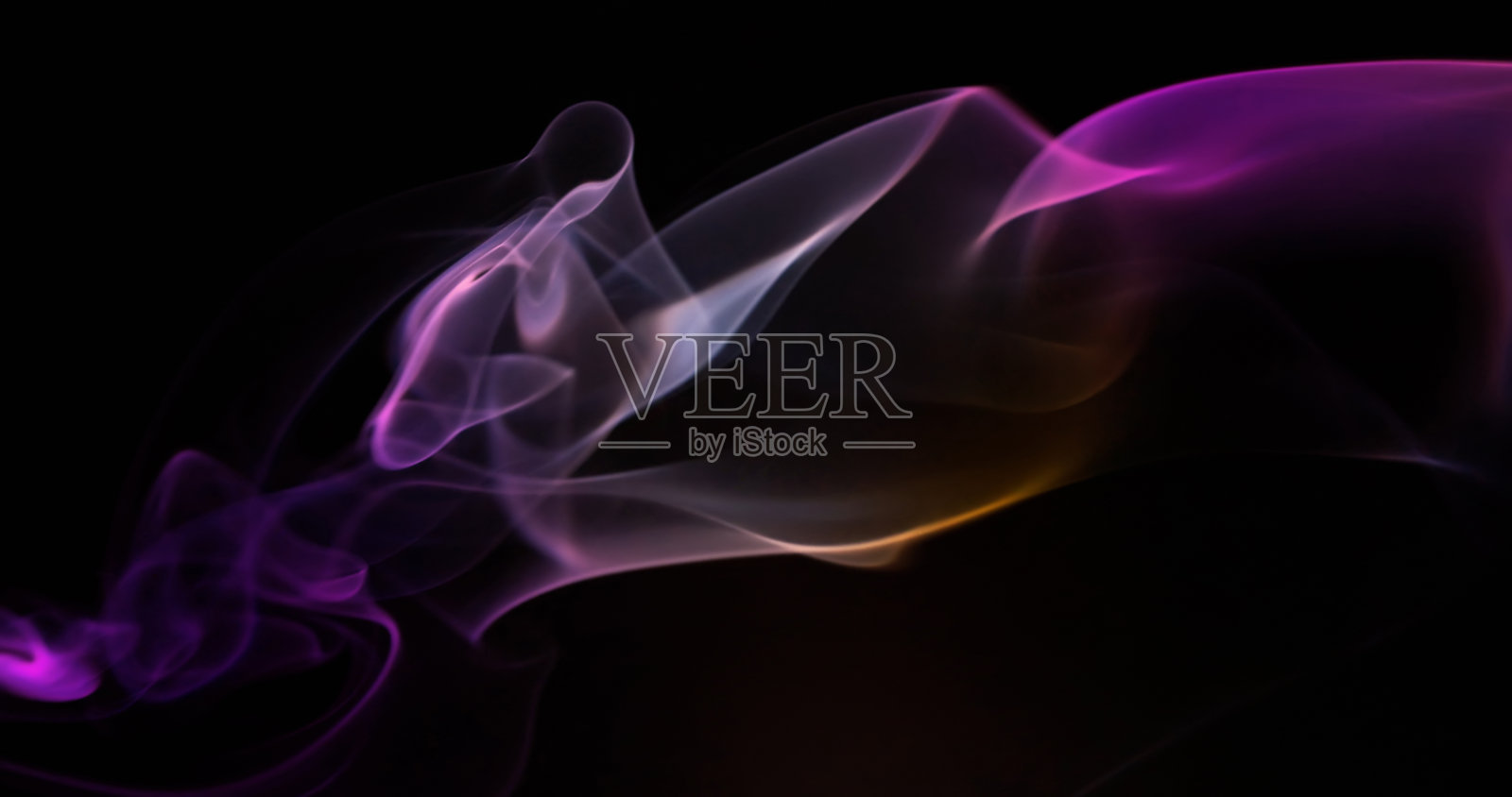 黑色背景上的多色烟雾照片摄影图片