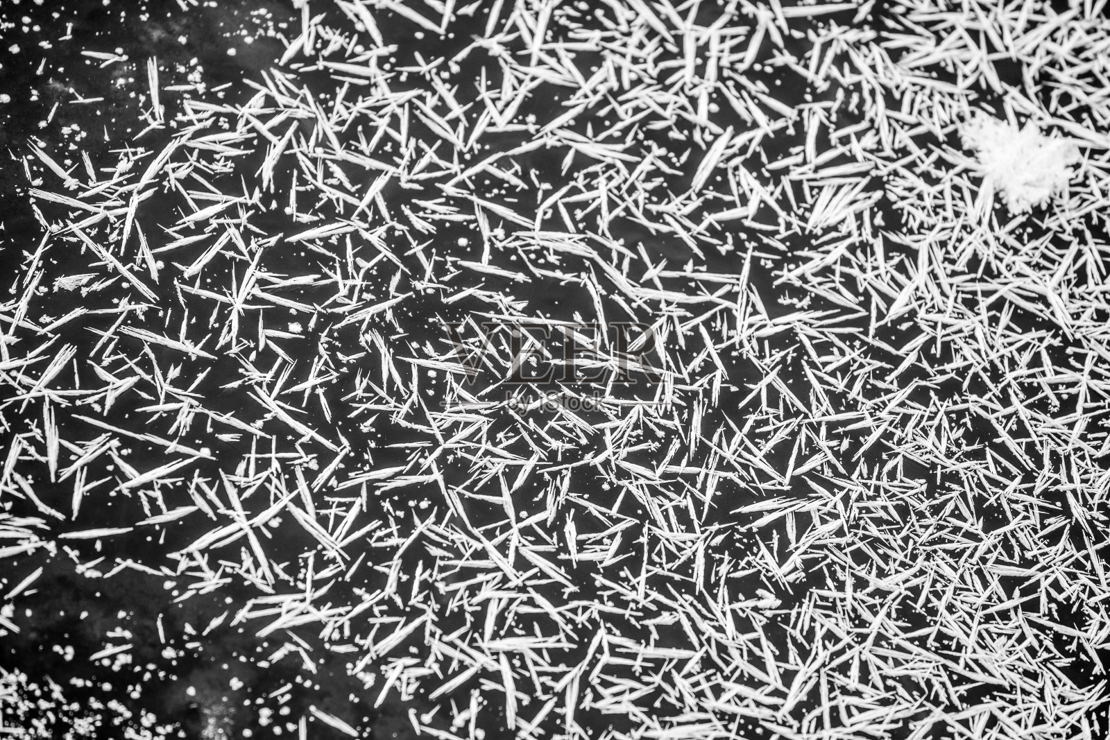 融化的冰上的纹理图案照片摄影图片