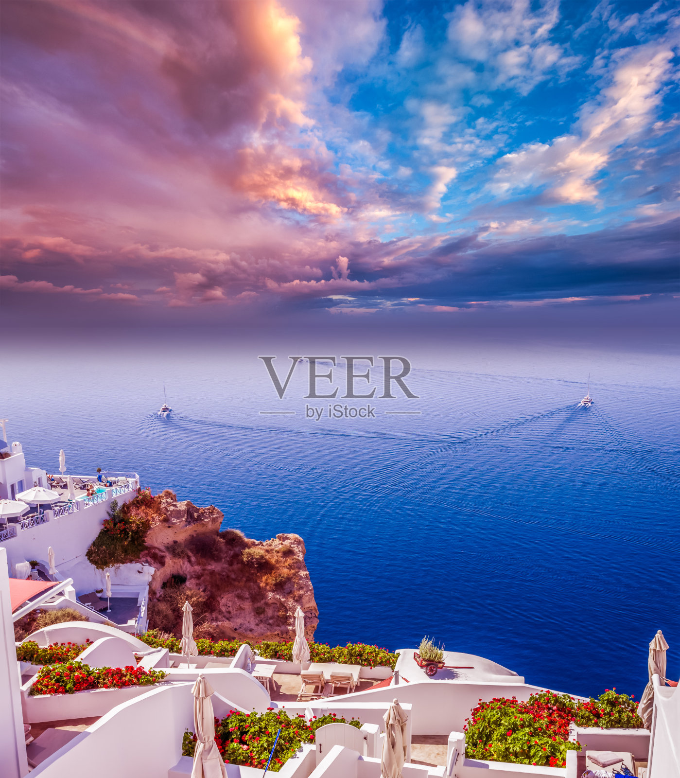 美丽的日落在伊亚村，圣托里尼基克拉德群岛，希腊照片摄影图片