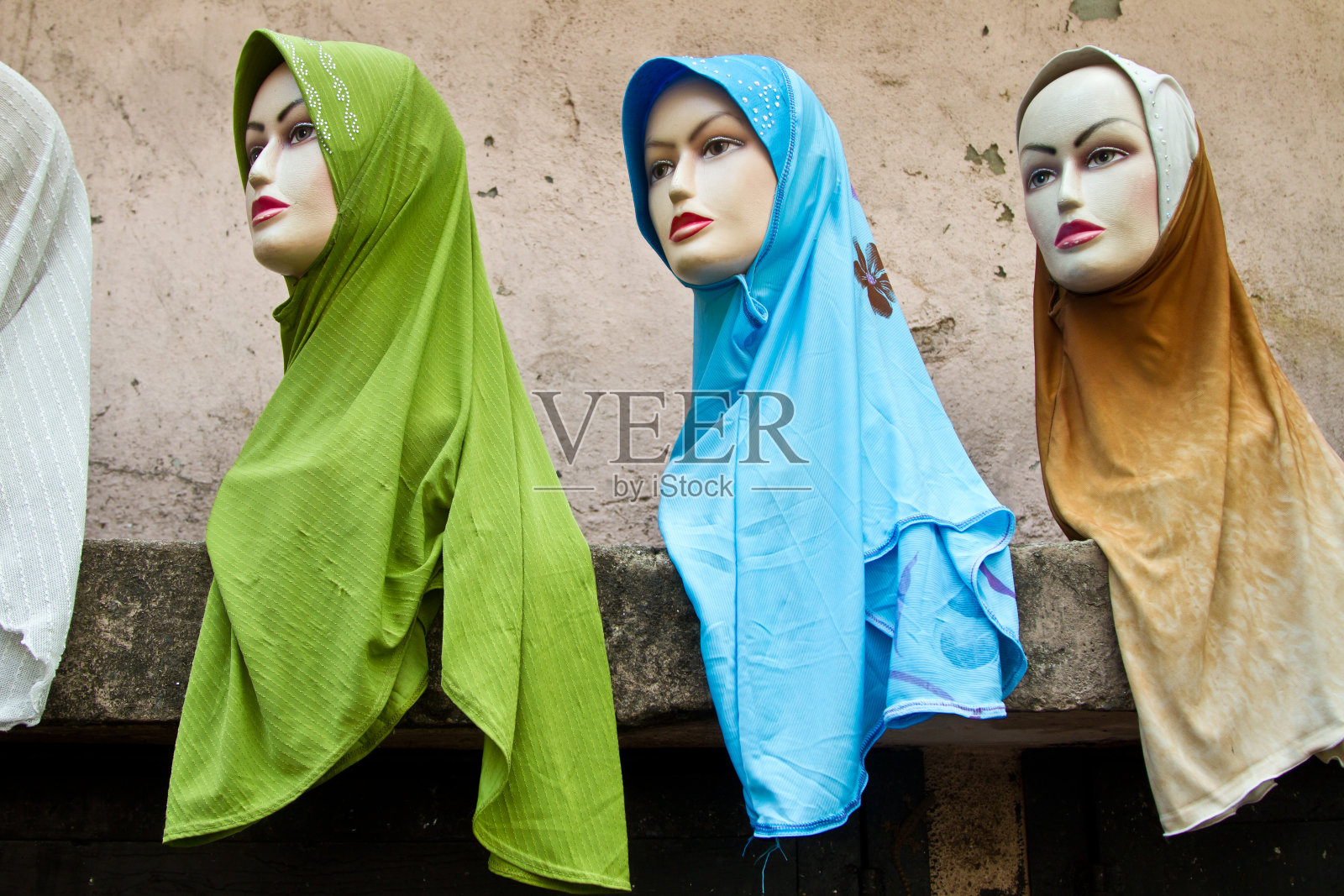 吉隆坡市场上的人体模特戴着头巾照片摄影图片