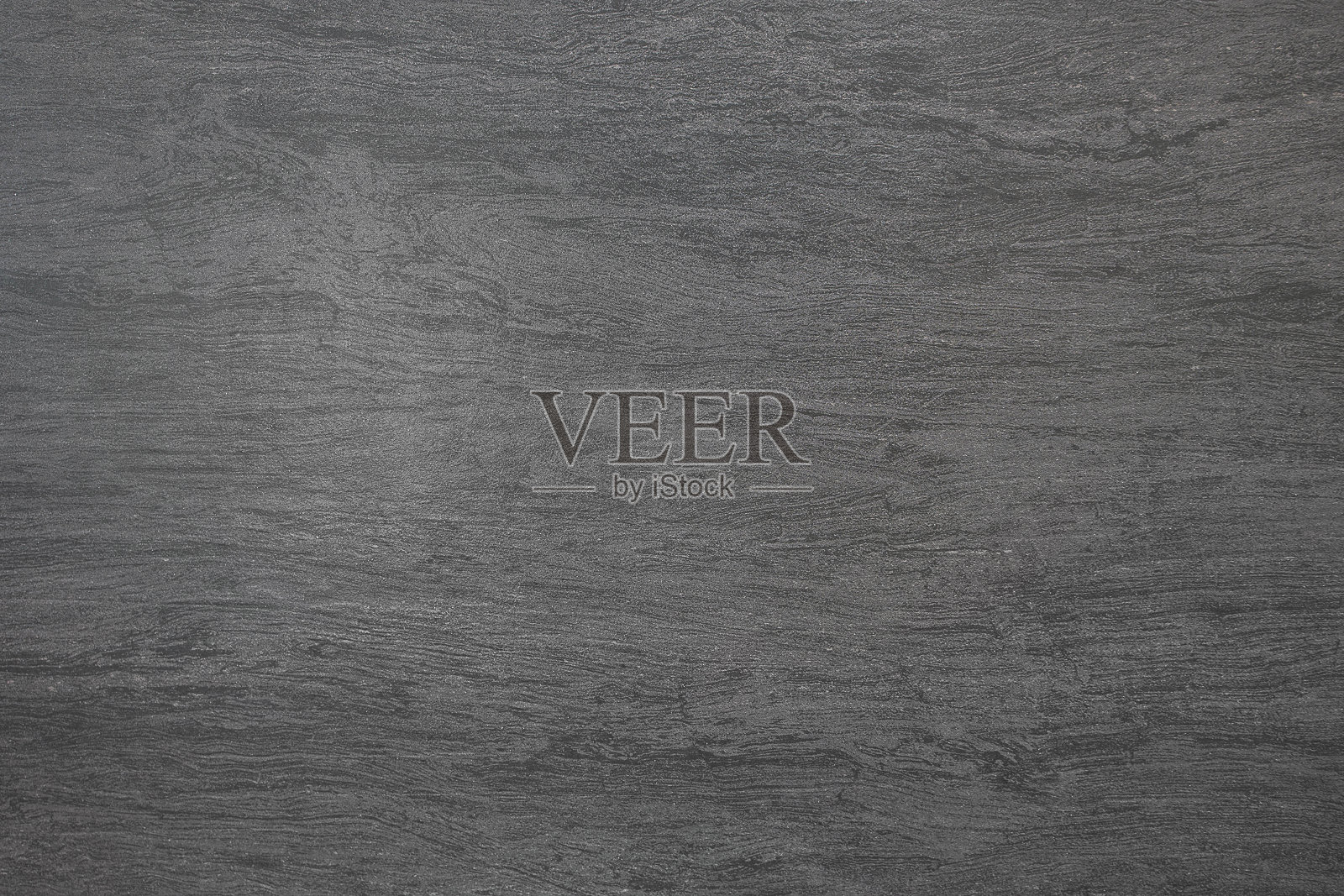 美丽的抽象垃圾石装饰背景。艺术粗糙纹理横幅。照片摄影图片