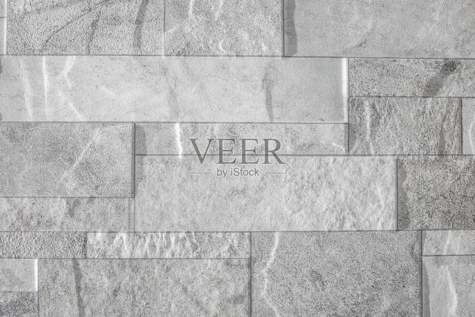 美丽的抽象垃圾石装饰背景。艺术粗糙纹理横幅。照片摄影图片