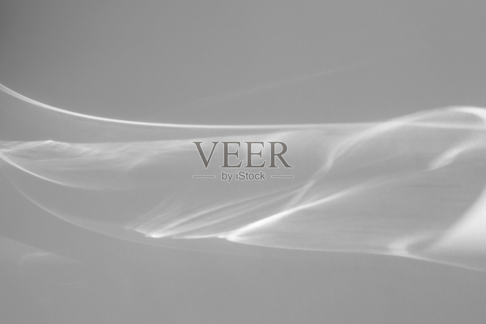 白色墙壁上的光影效果照片摄影图片