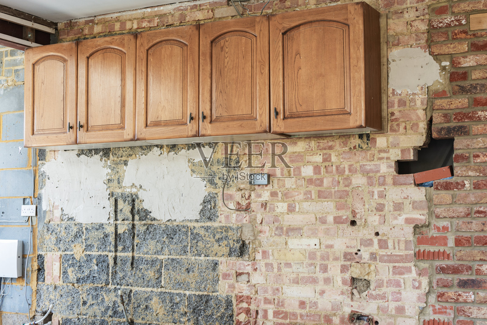 拆除旧厨房，准备墙面抹灰照片摄影图片