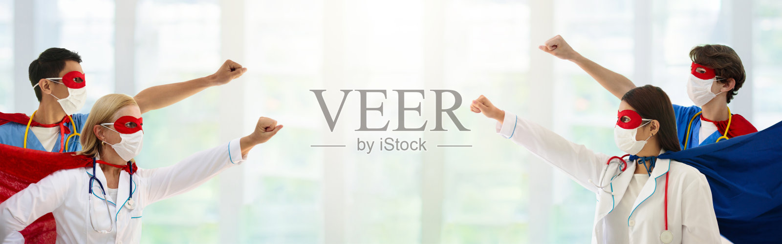 医生或护士戴口罩和超级英雄斗篷。照片摄影图片