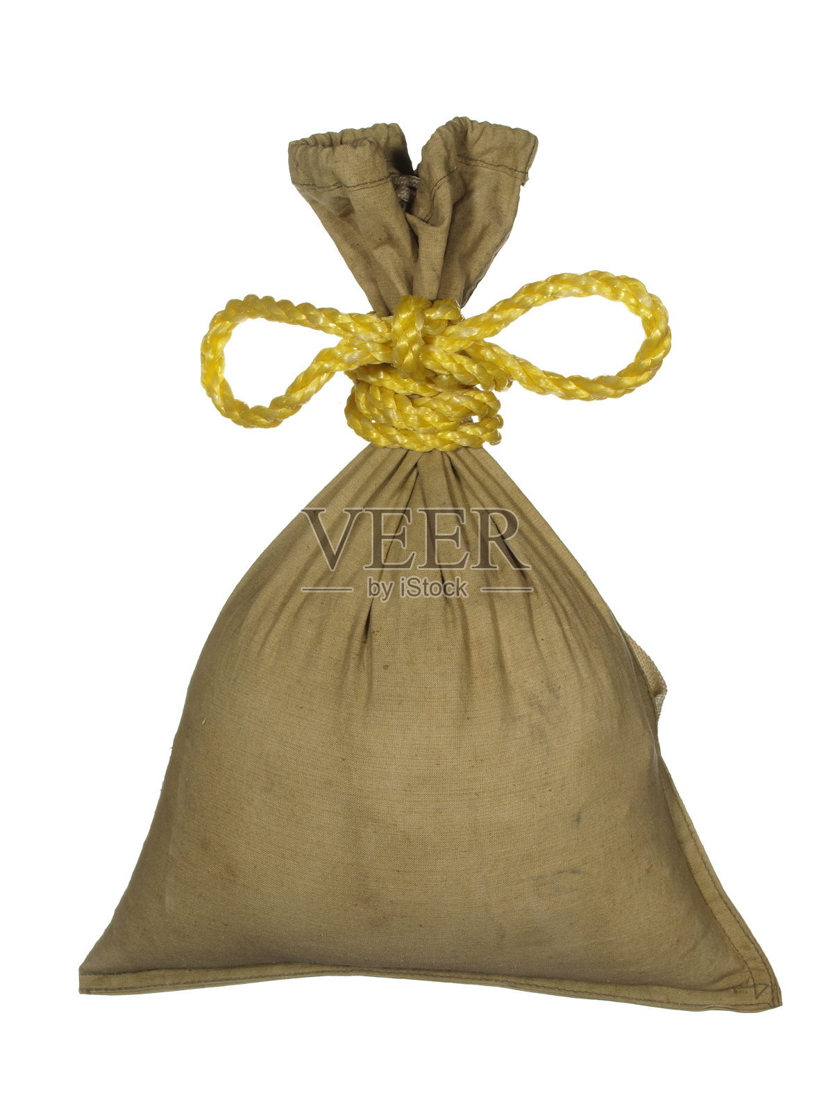 礼品袋系与金线隔离在白色的背景。照片摄影图片