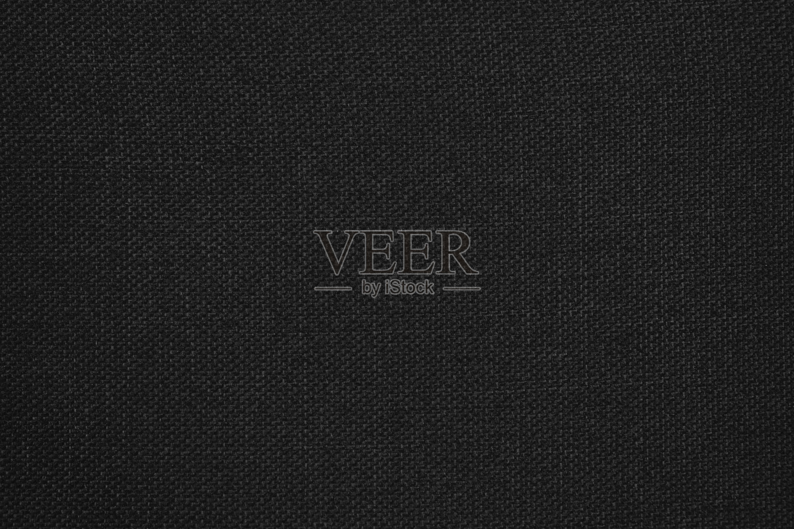 黑色的抽象背景。黑色织物纹理背景。照片摄影图片