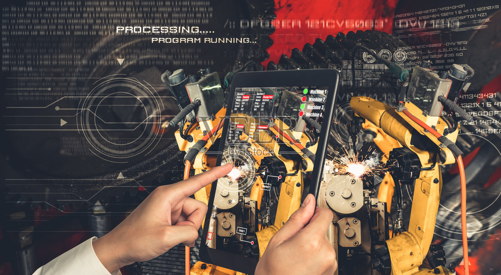 工程师通过增强现实工业技术控制机械臂照片摄影图片