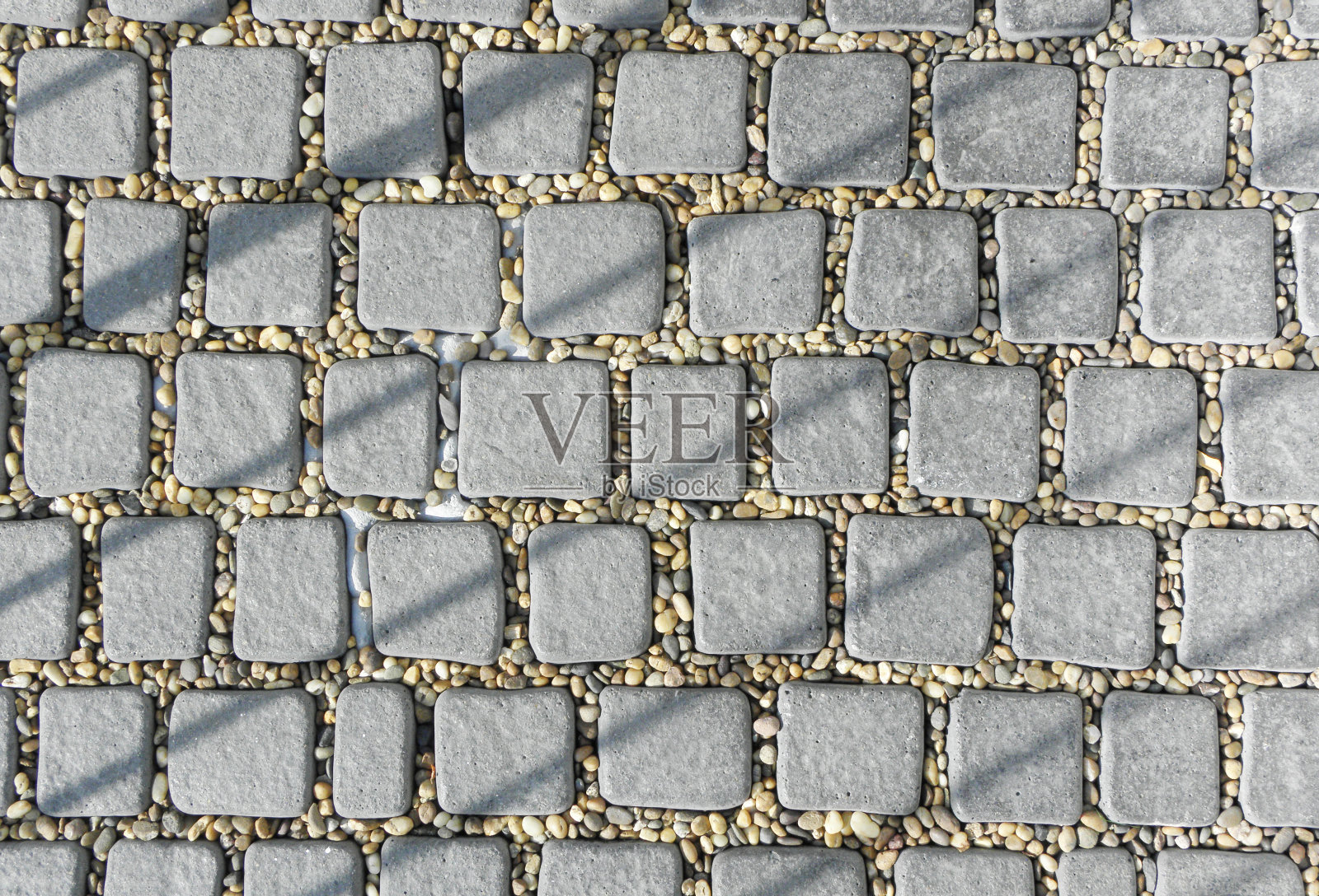 整齐的瓷砖在不同的灰色阴影照片摄影图片