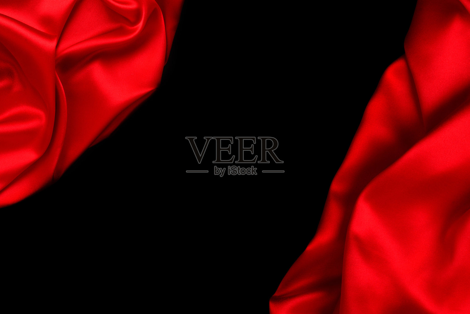 红色丝绸或豪华缎纹织物可作为抽象背景。俯视图照片摄影图片