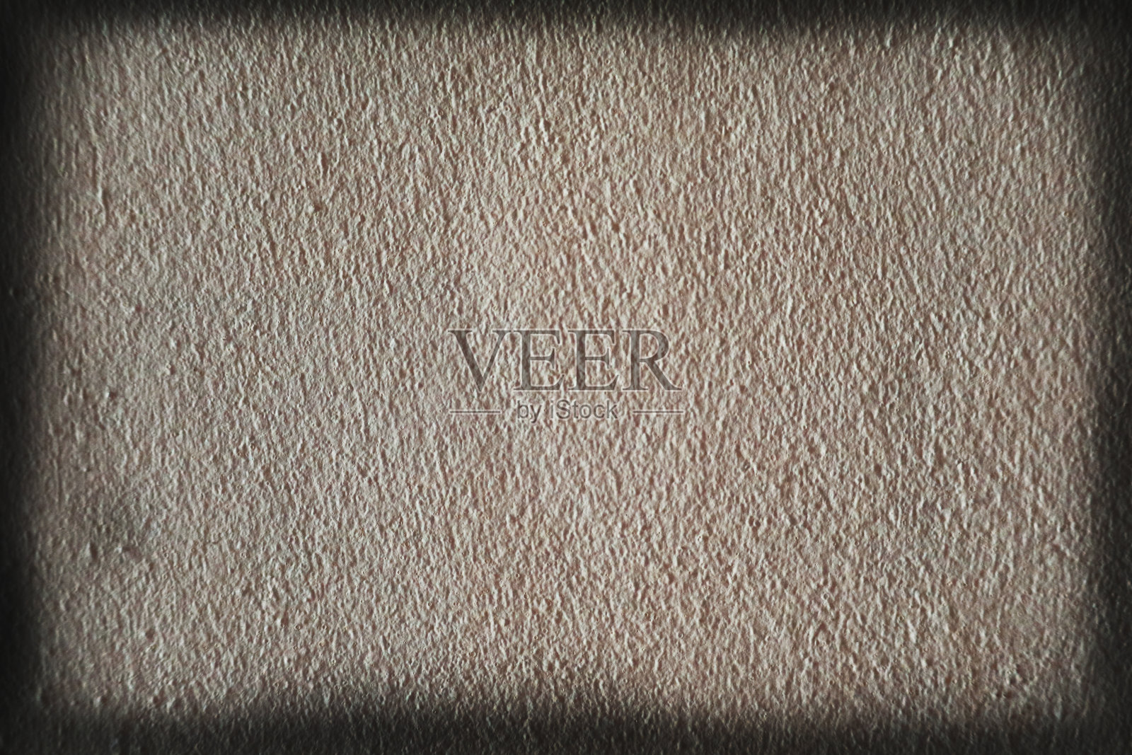 混凝土墙表面粗糙的奶油色纹理和深色边框照片摄影图片