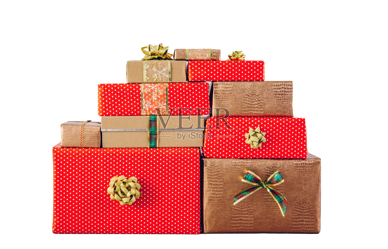 大量的红色点和金色包裹呈现孤立的白色背景。照片摄影图片