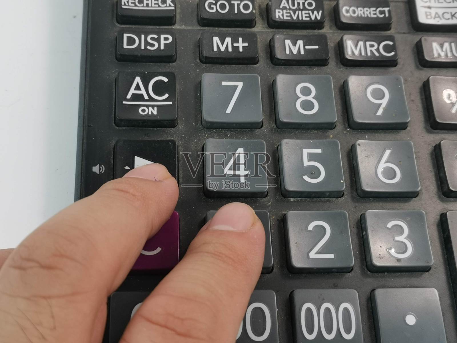 近距离的照片计算器在白色的背景照片摄影图片