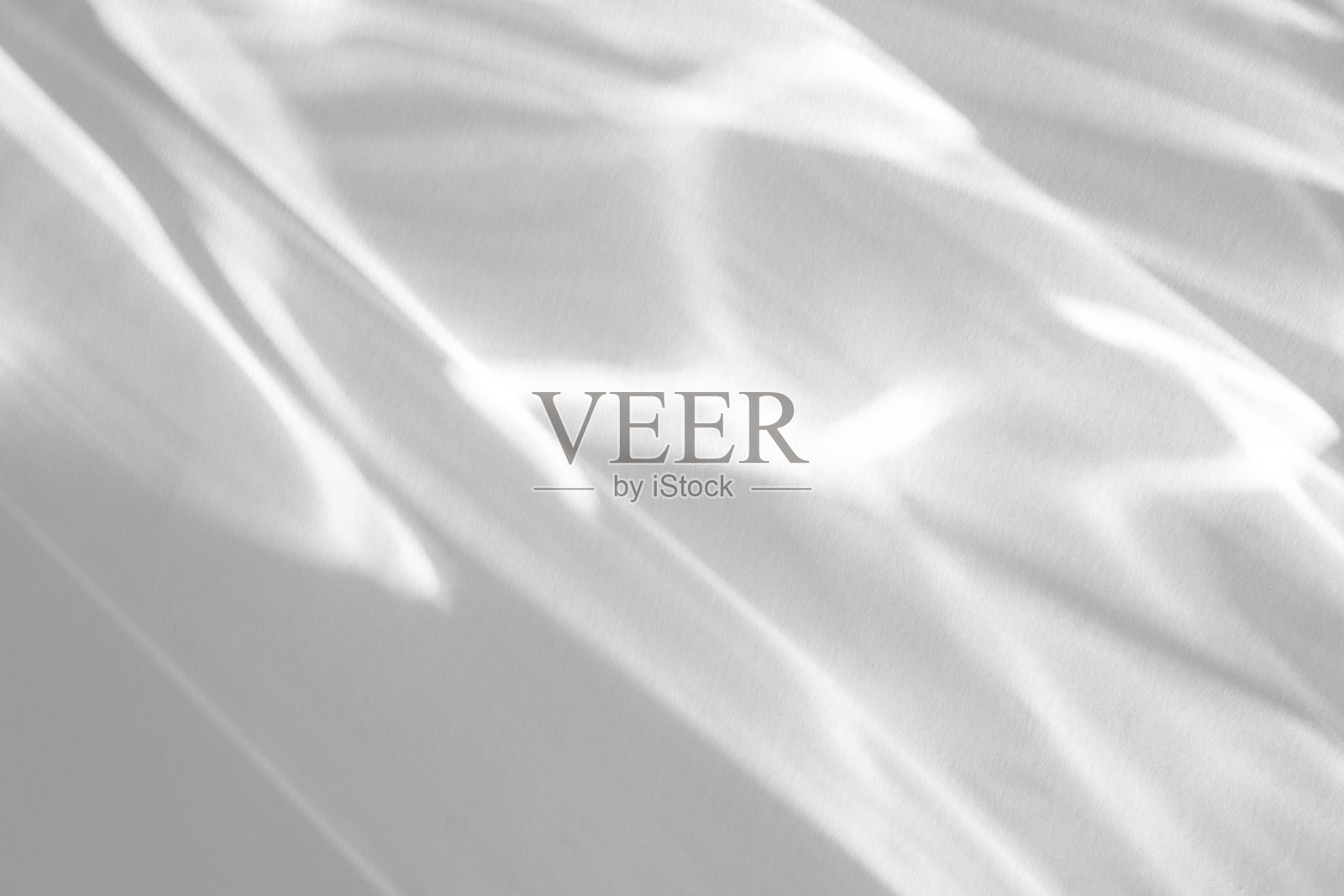 白色墙壁上的光影效果照片摄影图片