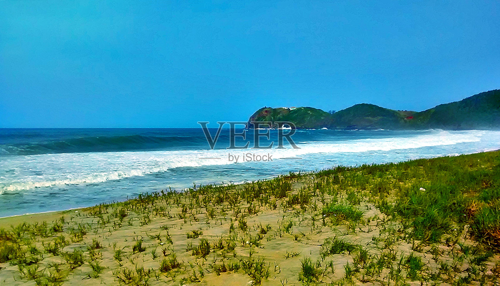 海滩，海浪和山脉。照片摄影图片