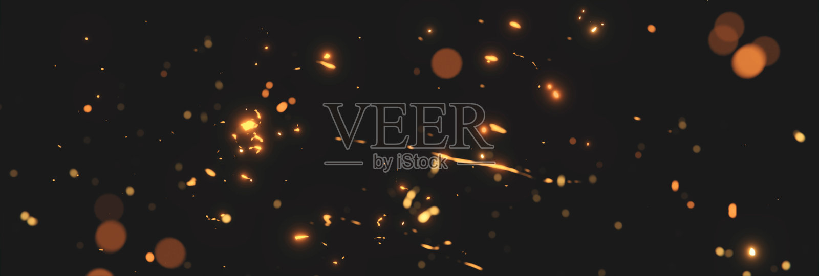 模糊的火花从霓虹灯前面的黑色背景照片摄影图片