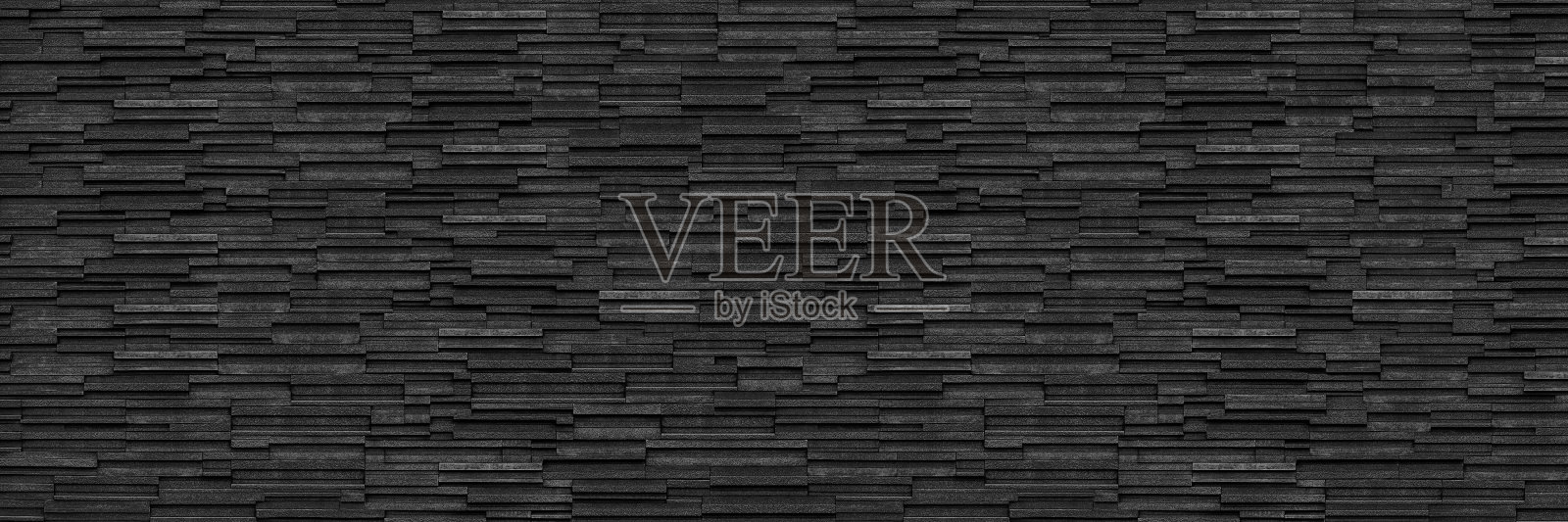 水平的暗黑色现代石板砖墙的图案和背景照片摄影图片