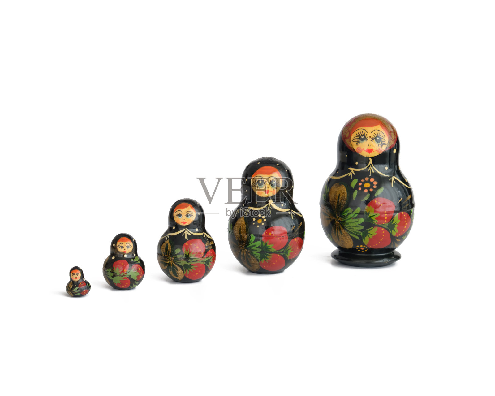 白色表面上孤立的俄罗斯套娃照片摄影图片