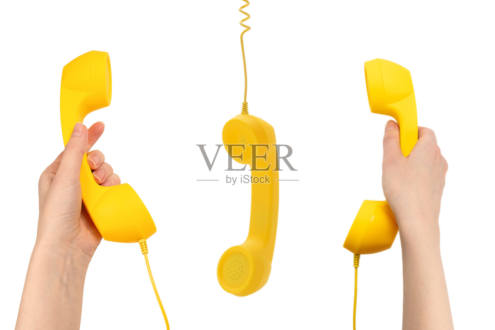 黄色手机孤立在白色。照片摄影图片