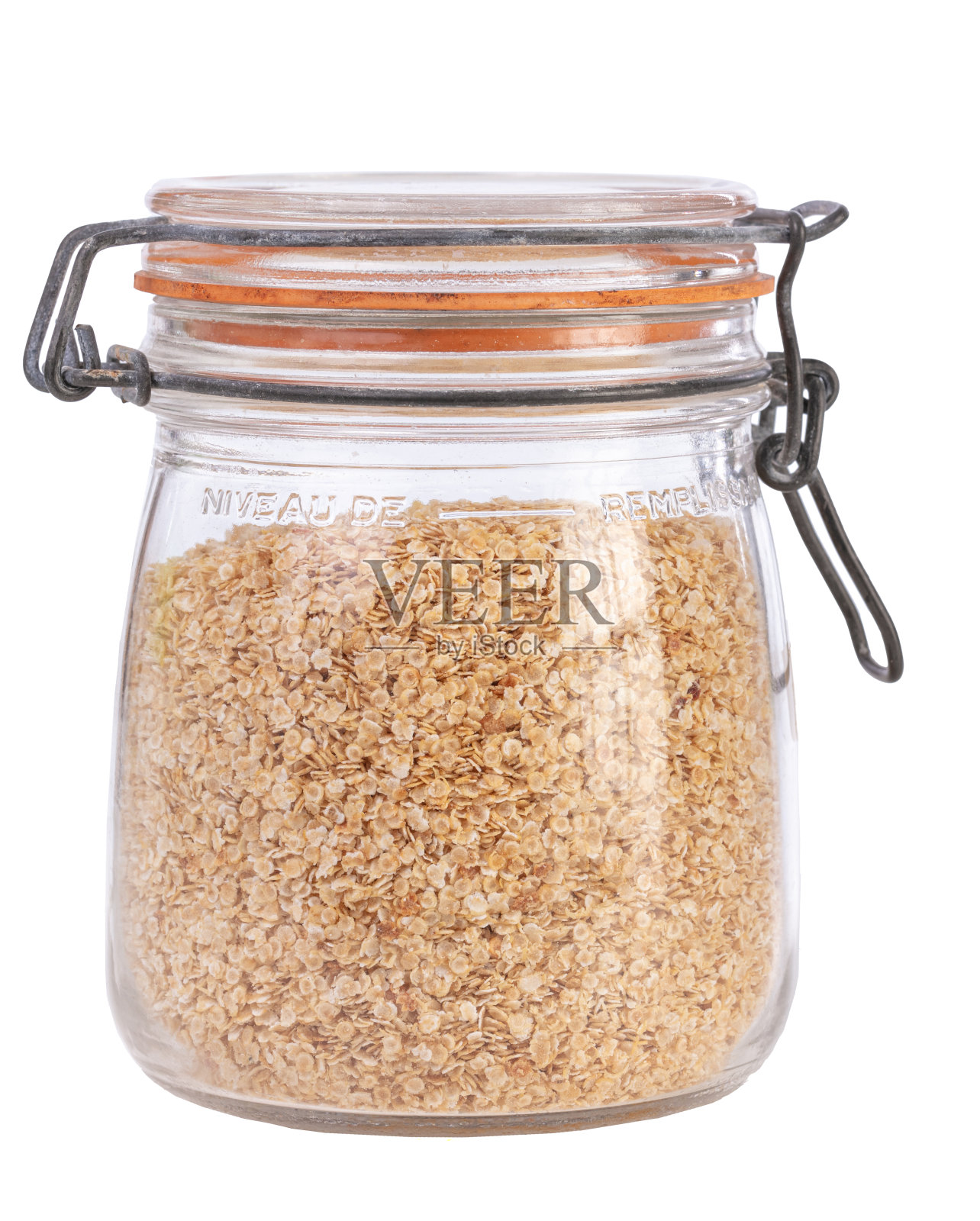 在一个封闭的玻璃罐子里的荞麦薄片照片摄影图片