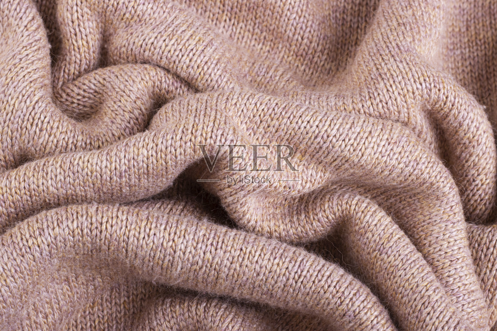 皱褶织物纹理背景，皱褶棕色织物照片摄影图片