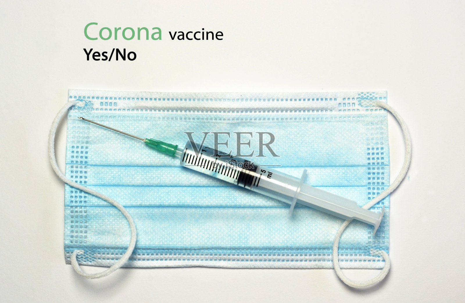 医用蓝白口罩与疫苗针在空白拷贝空间背景照片摄影图片