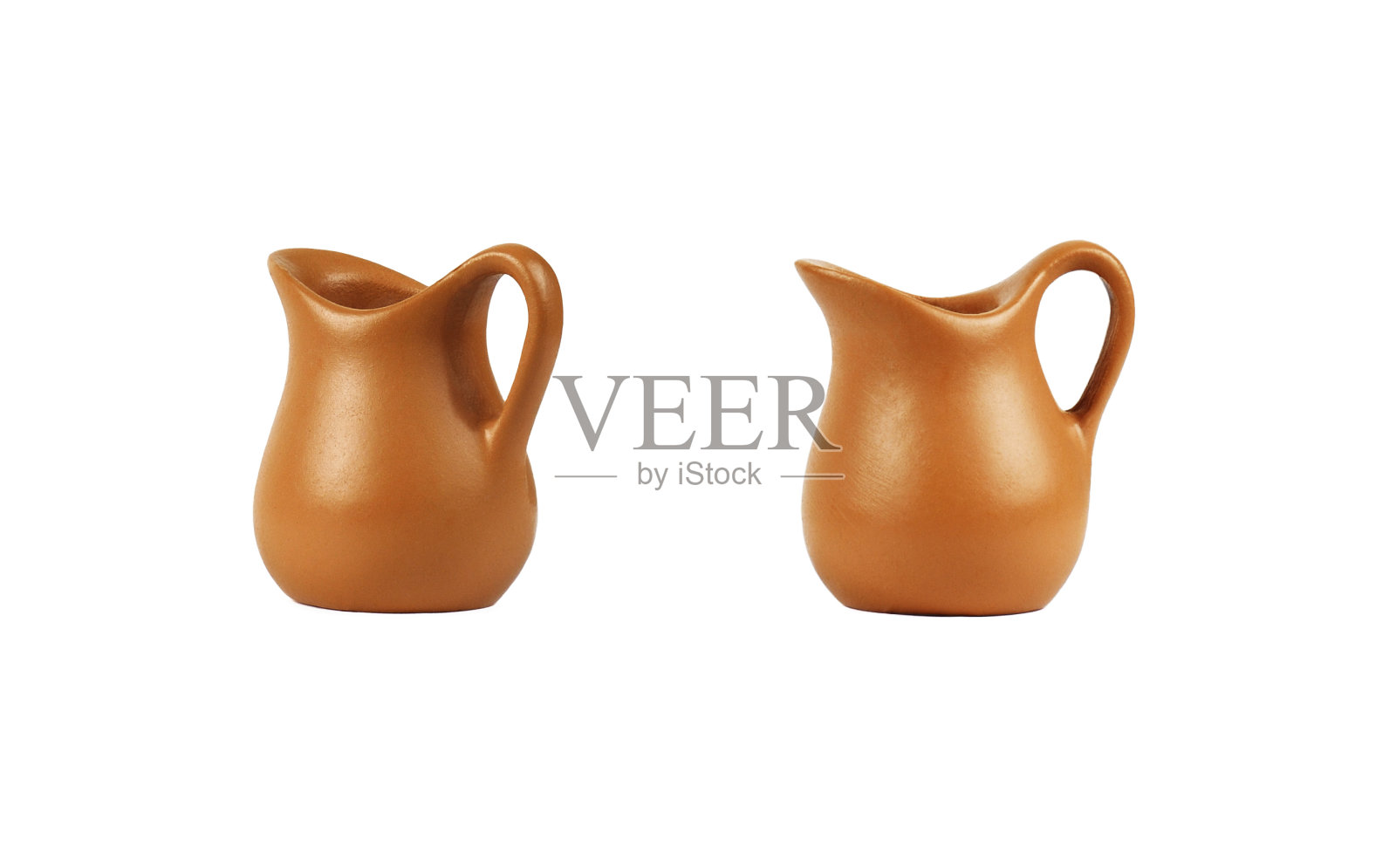 一套小小的棕色空陶罐照片摄影图片